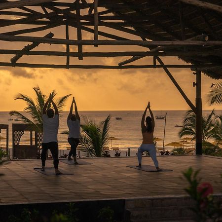 The Mora Zanzibar Hotel Matemwe  Luaran gambar Sunset yoga at the beach