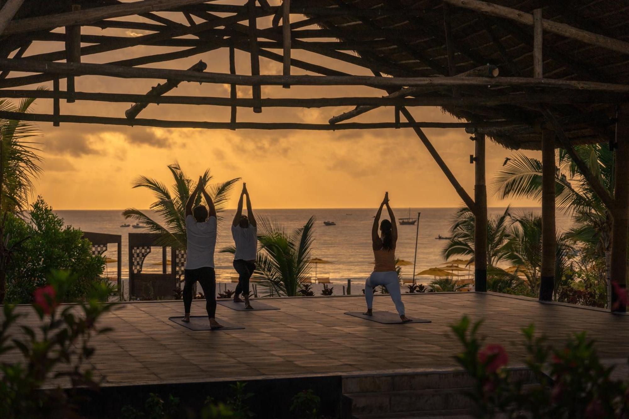 The Mora Zanzibar Hotel Matemwe  Luaran gambar Sunset yoga at the beach